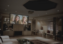 Different lighting scenes on display, here a home cinema scene is shown